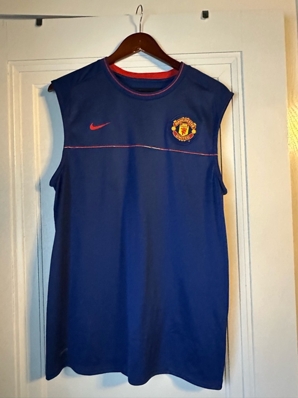 Manchester United Nike Blue Athletic FitDry Jersey with Red Trim